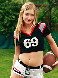 Football player Jewel takes off her jersey and shows her small titties