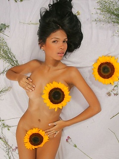 Tight body Latina Karla Spice wears sunflowers over her tits and pussy