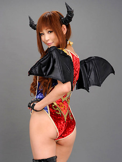 Japanese costume babe Sayuri Ono wears thigh high black latex boots