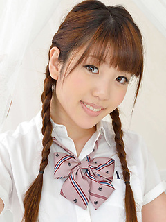 Sweet Japanese teen Mizuho Shiraishi in a short skirt and pretty pigtails