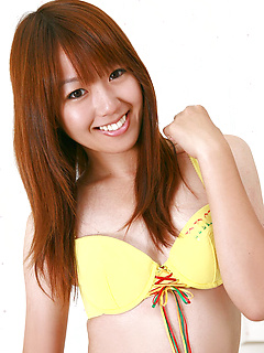 Adorable Japanese darling Shizuka Sakura poses in her sexy yellow bikini