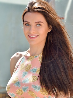 Breathtaking beauty in a short and skintight dress has fun flashing her panties in public